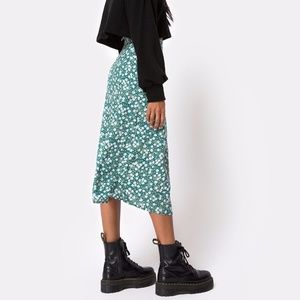 Midi green skirt with white flowers